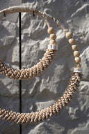 the-double-shell-necklace-on-stand-natural