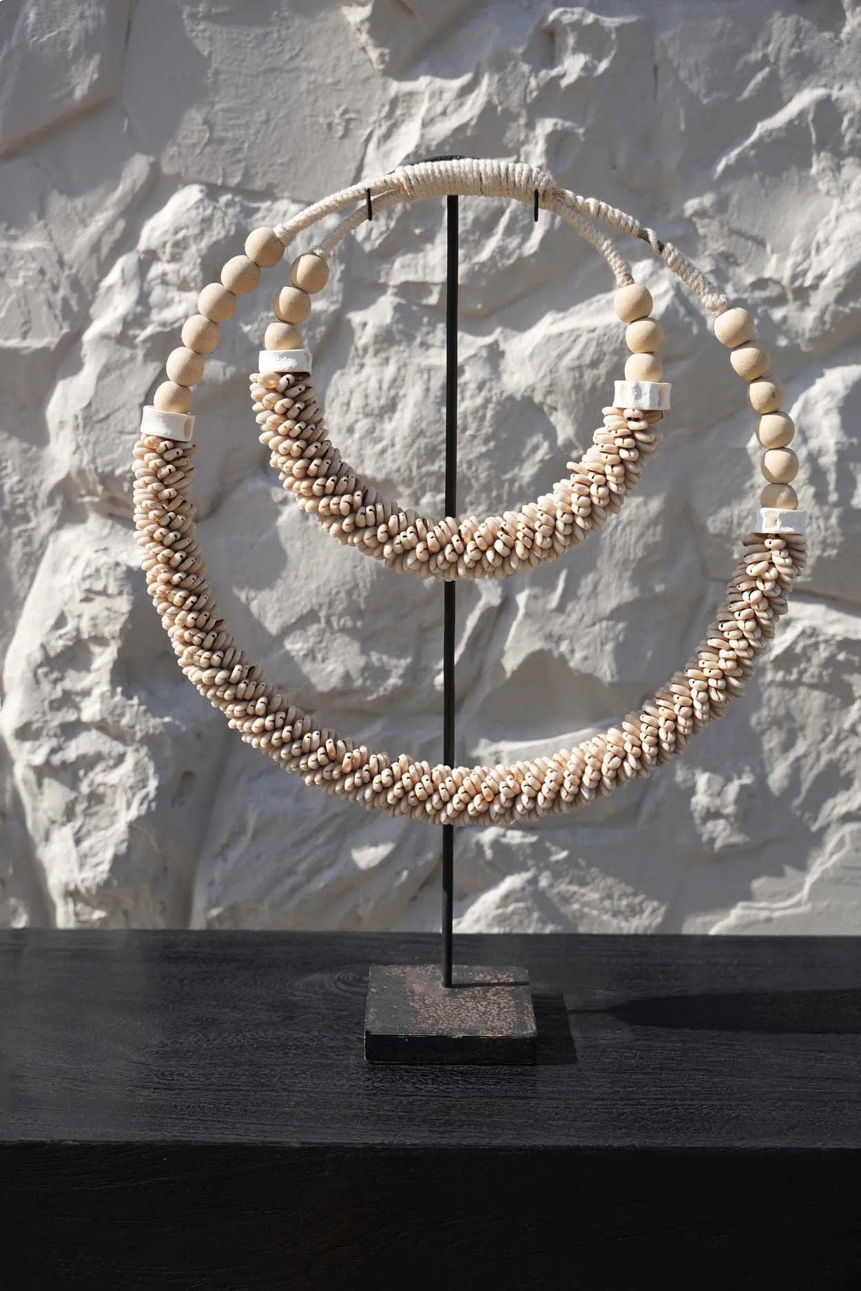 the-double-shell-necklace-on-stand-natural
