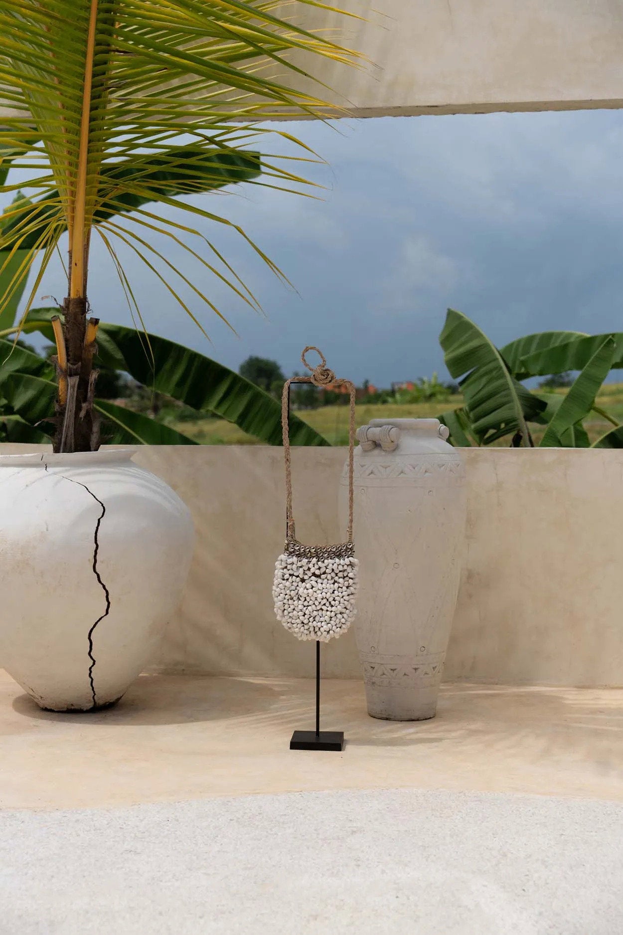 the-shell-purse-on-stand