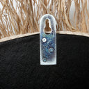 the-raffia-cowrie-mirror-natural-white