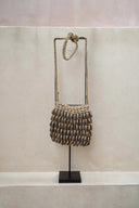 the-shell-purse-on-stand