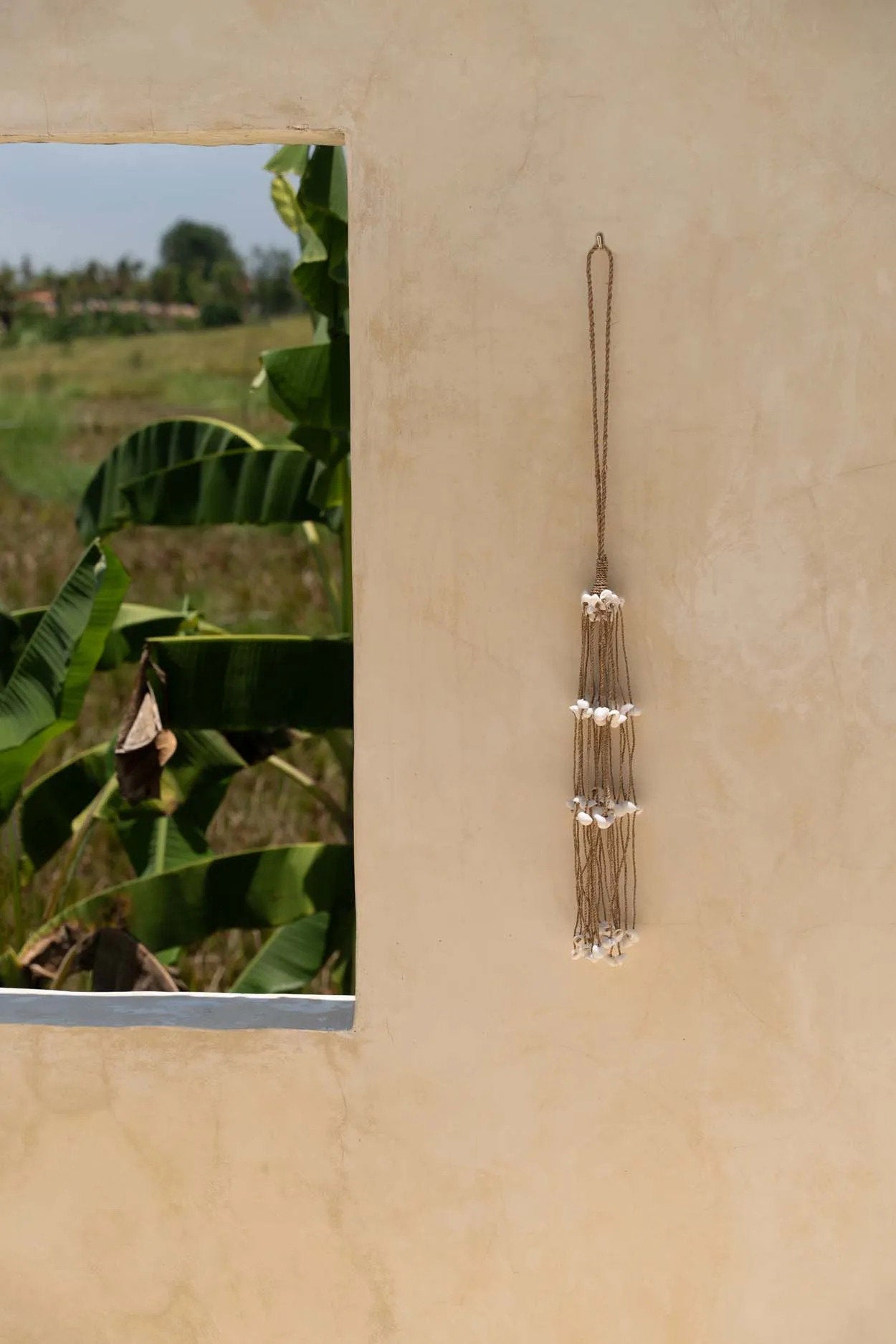 the-long-shell-tassel-white