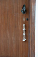 the-long-shell-tassel-white