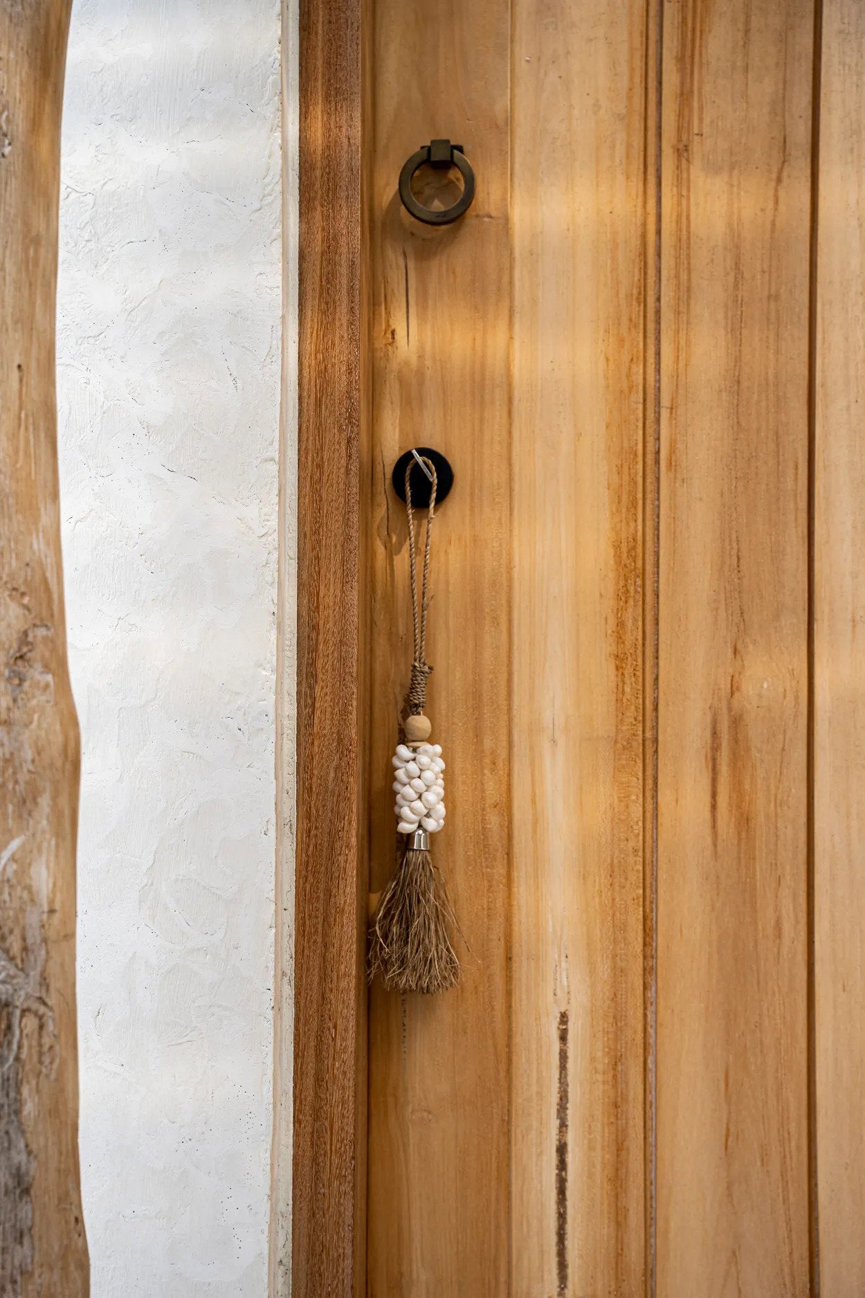 the-cowrie-and-raffia-tassel-natural