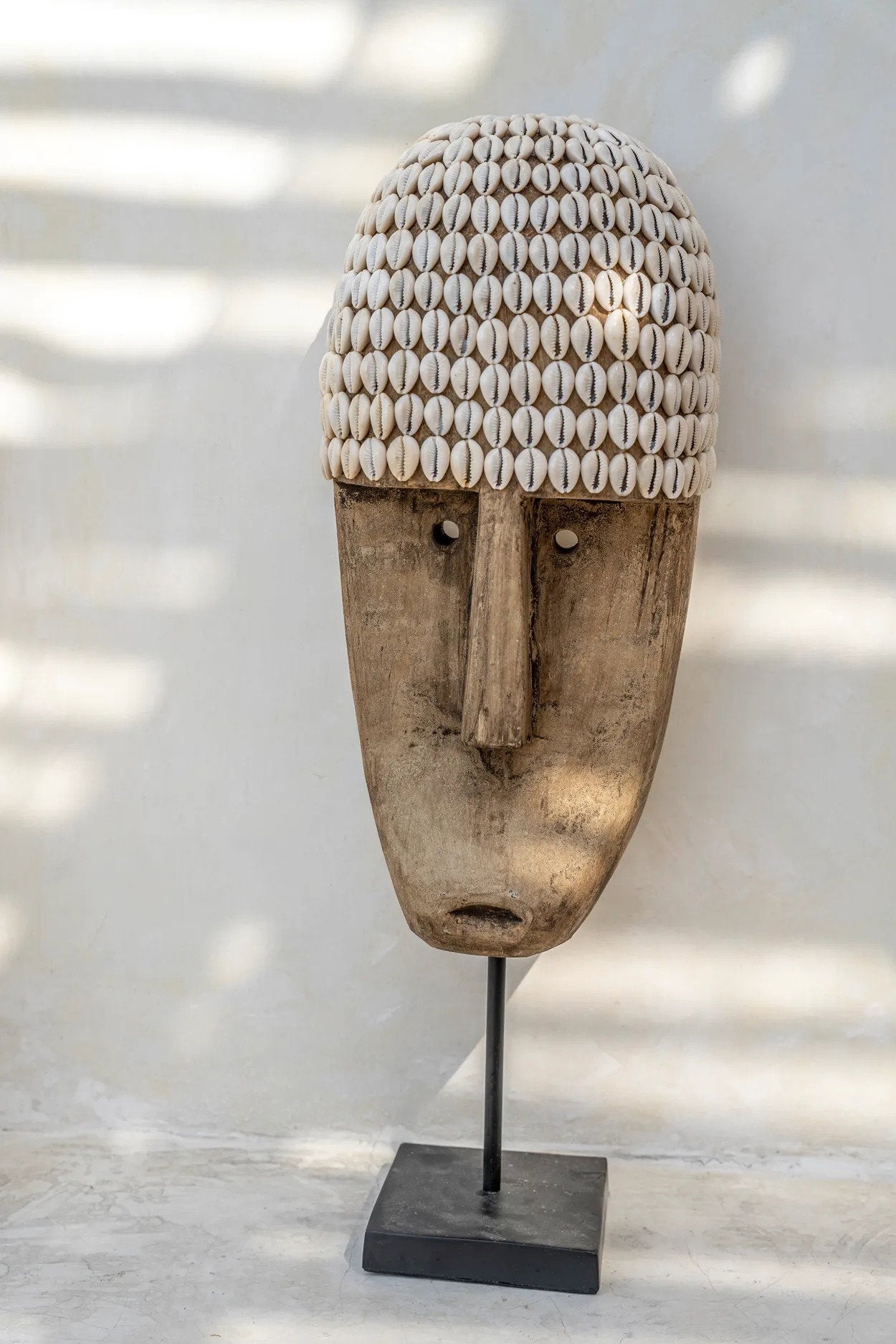 the-cowrie-mask-on-stand-large