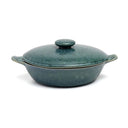 An artisanal ceramic stew pot with lid in aqua blue tone, enriched with unique texture and handles.