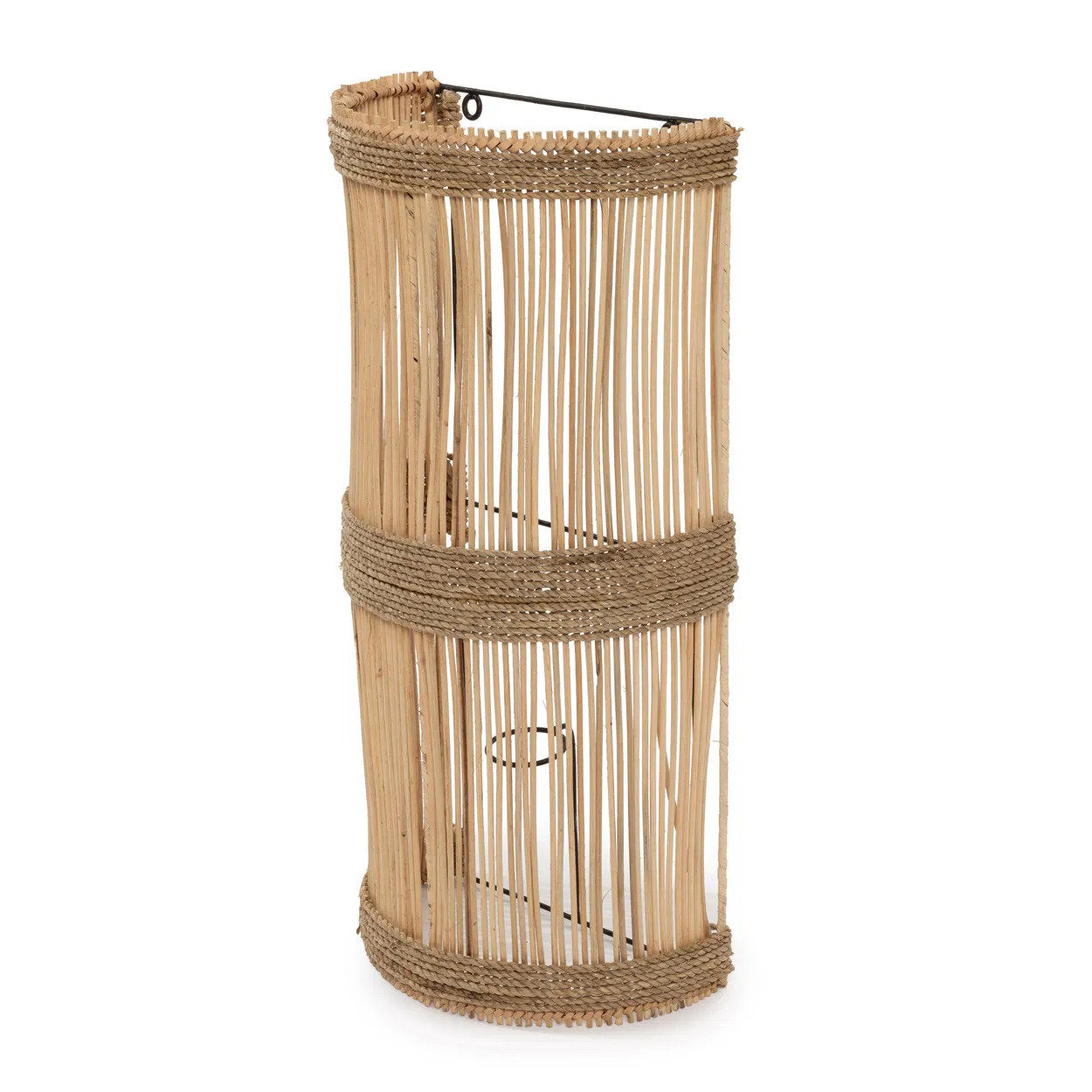 The Jalal Wall Applique in a covered outdoor lounge, creating a serene, resort-like ambiance with its warm glow.