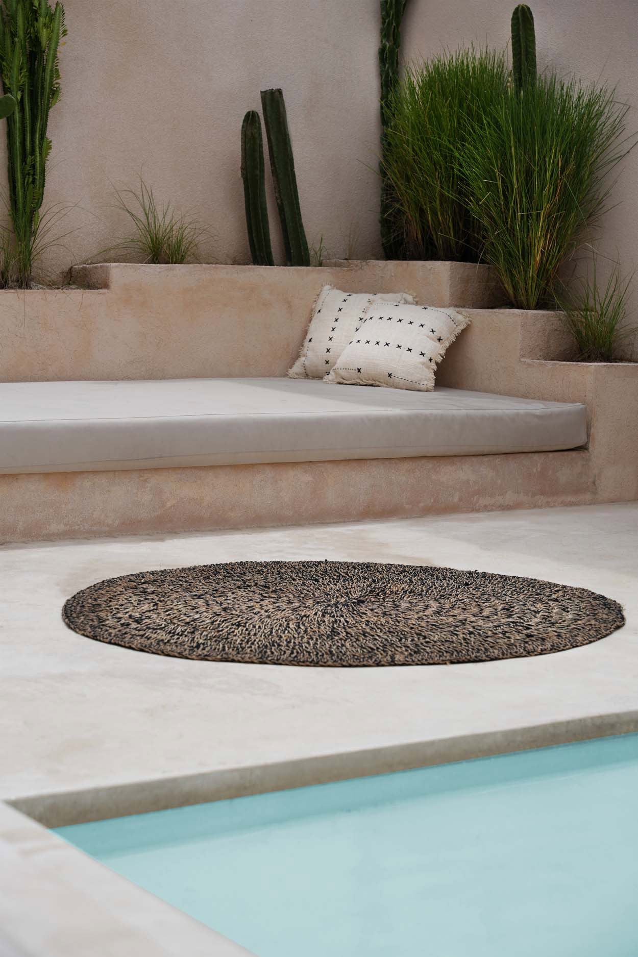 Elegant natural black cushion cover for a stylish, cozy atmosphere
