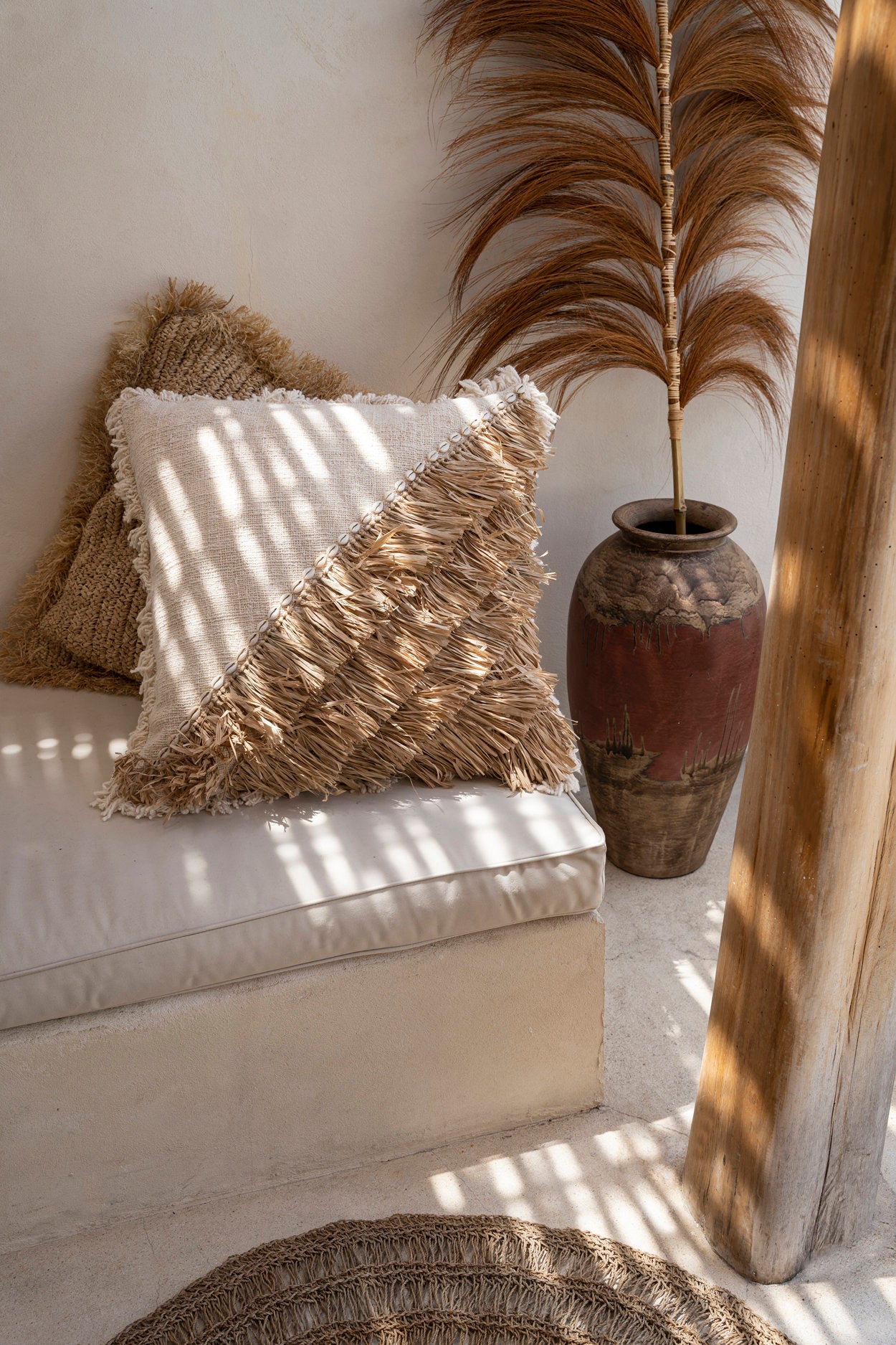 Natural white 60x60 cushion cover with boho raffia accents