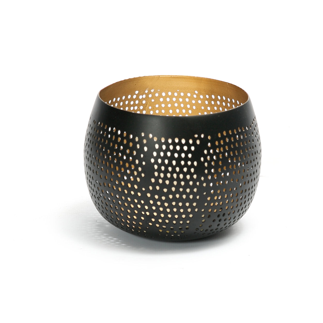 The Pierced Ball Black Gold S, small round brass candle holder with pierced cut-out design.
