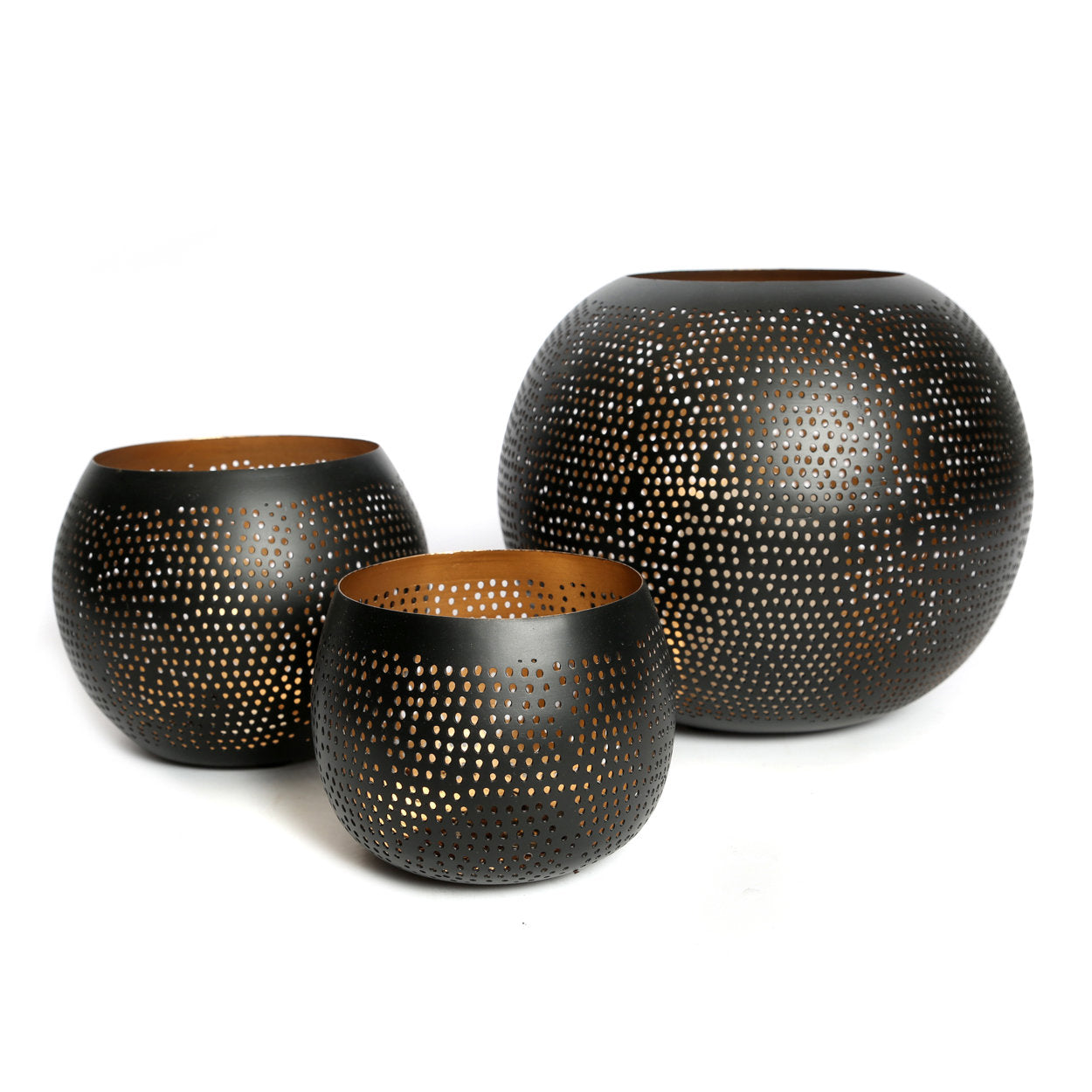 Compact black gold candle holder, handmade brass sphere with decorative perforations.