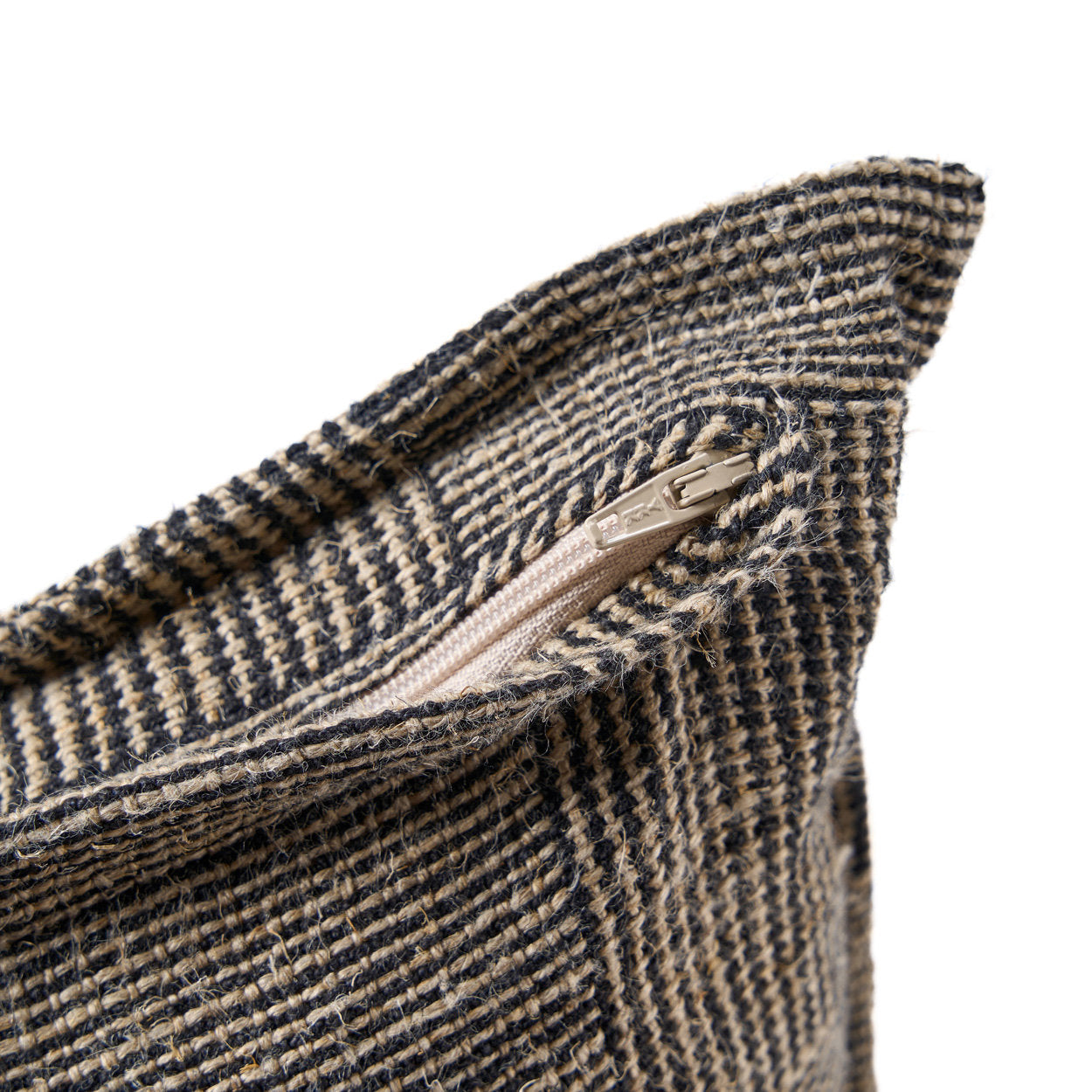 Artisan-made black and natural linen cushion cover with soft, breathable fabric for cozy interiors