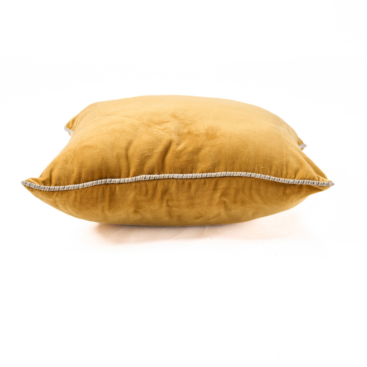 Bold mustard velvet square cushion cover for adding warmth and elegance to interiors