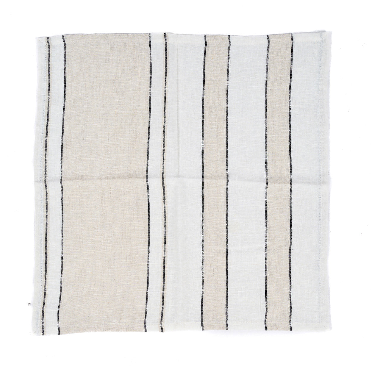 Close-up of black and white linen napkin with two-tone striped design, showing soft texture and neat square shape.