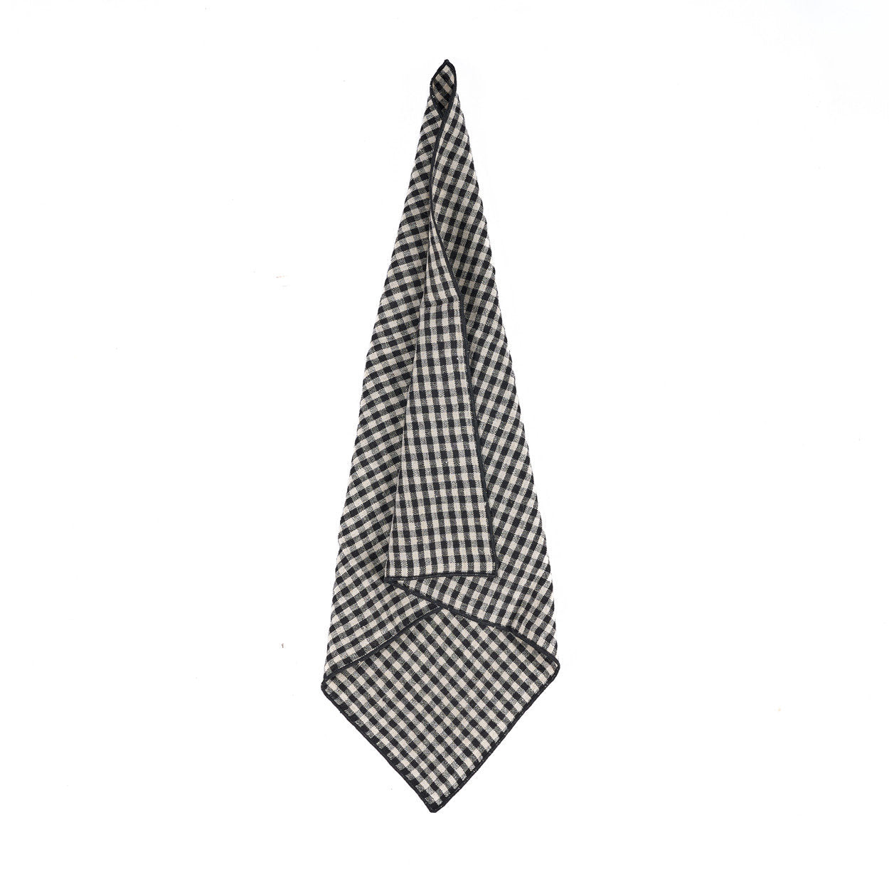 The Picknick Napkin in natural black, a 45x45 vichy napkin for picnic made from durable linen with a checkered design perfect for outdoor settings.