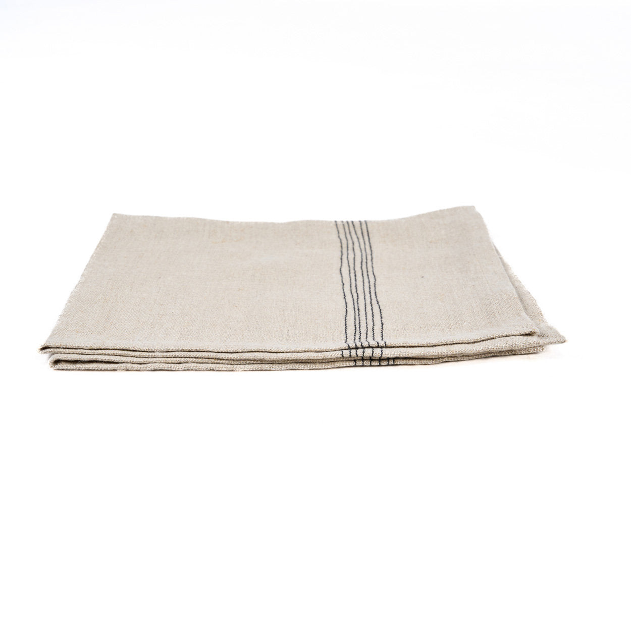 Folded 45×45 cm natural linen napkin with subtle black stripes, soft and breathable fabric for everyday use
