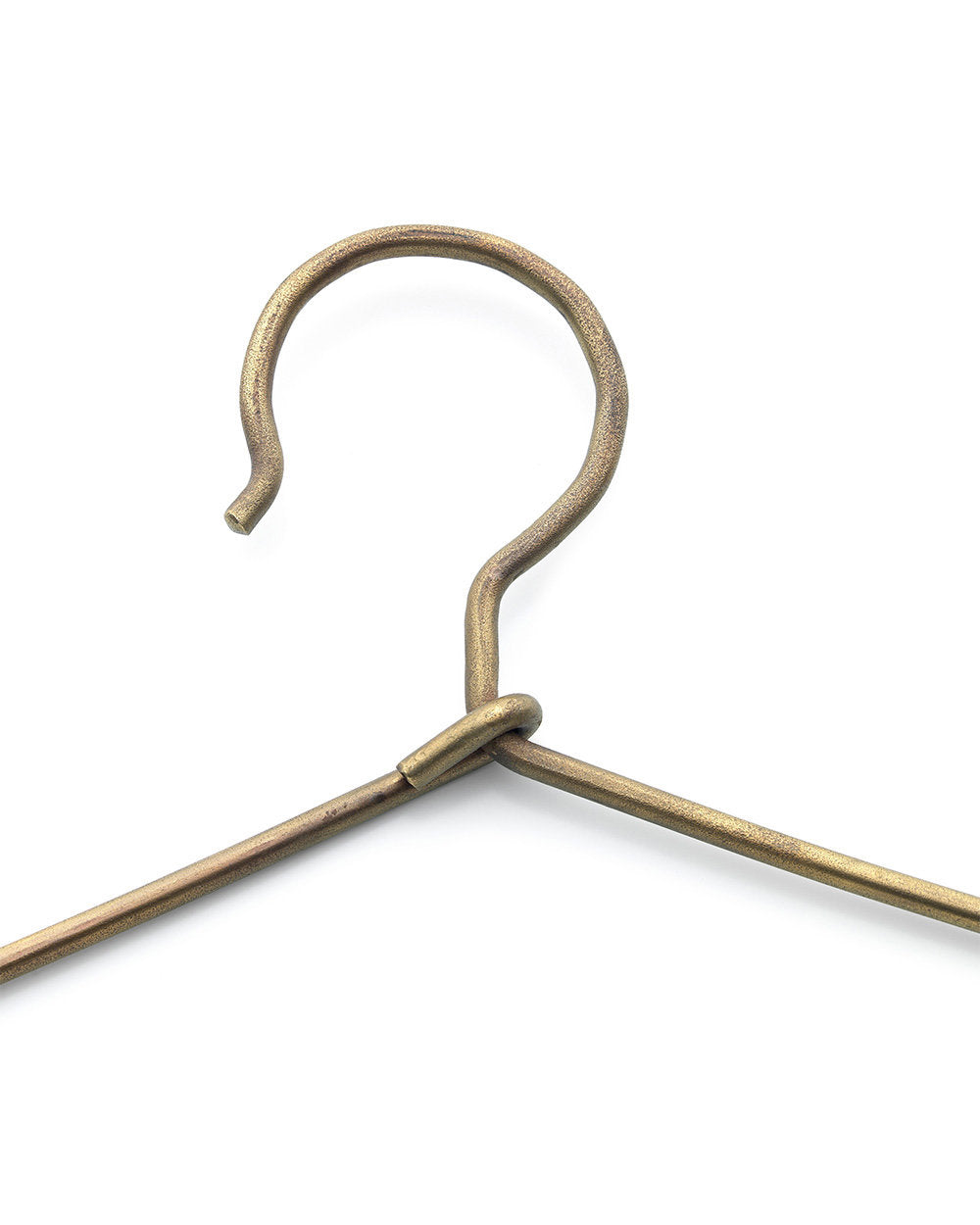 Medium-sized gold metal hanger, sturdy and decorative for daily clothing use.