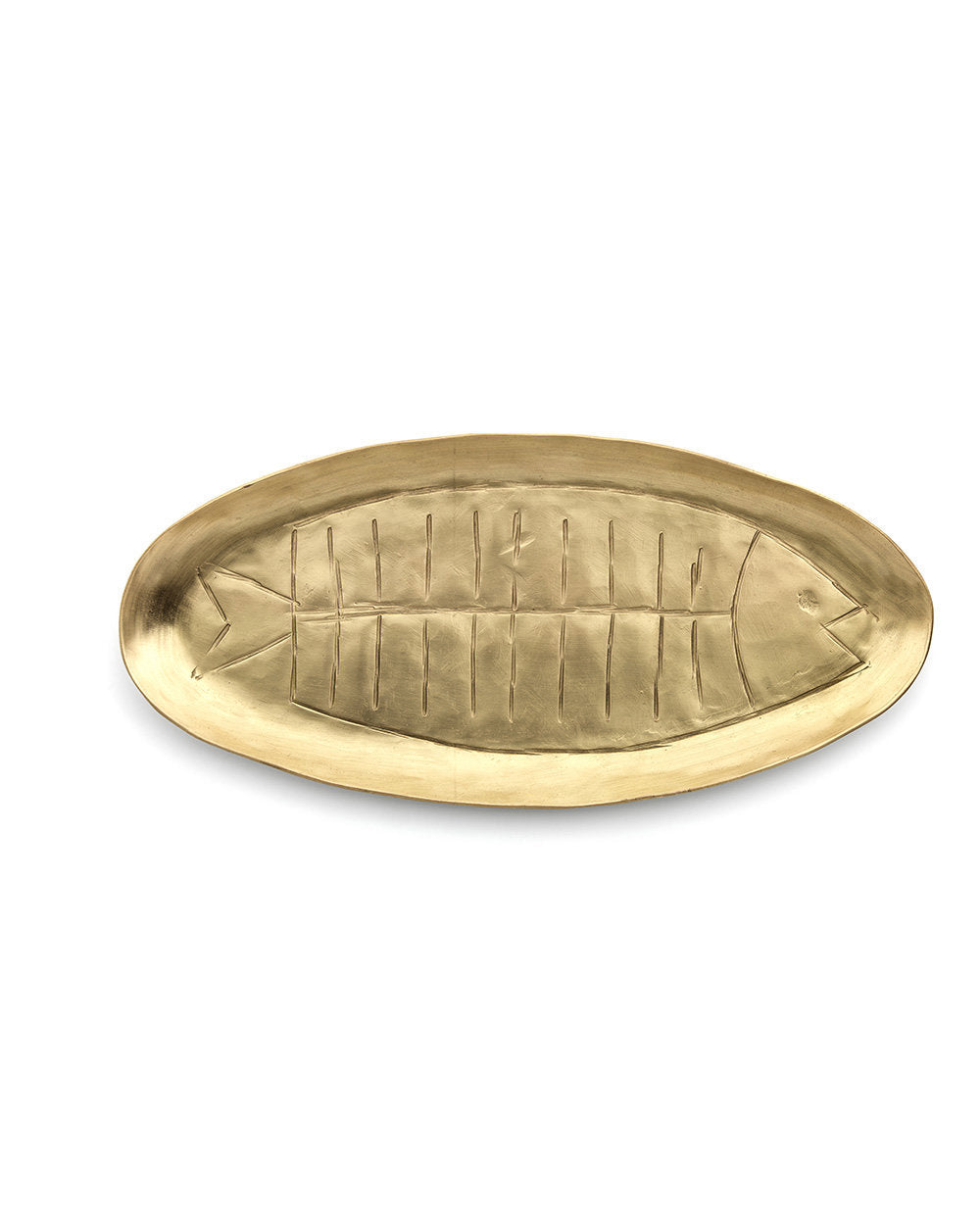 Close-up of large golden brass fish tray, handmade with subtle variations in tone and shape.