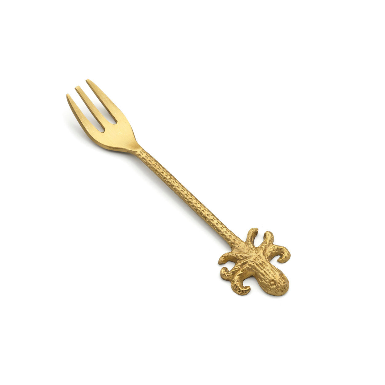 Close-up of handcrafted gold octopus fork, highlighting intricate handle design and natural artisanal variations.