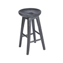 A sculptural black wooden bar stool crafted from solid mango wood for modern interiors.
