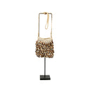 Natural brown shell purse on stand decor, handmade in Bali.