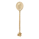 A brass salad spoon in sophisticated golden hue and palm tree accent, enriched with twisted handle. 