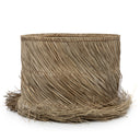 A pandan fibre lamp shade in natural color with inner iron ring support for lamp fitting, dressed with raw fringe.