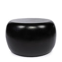 Round black side table in matt finish, handmade from resin.