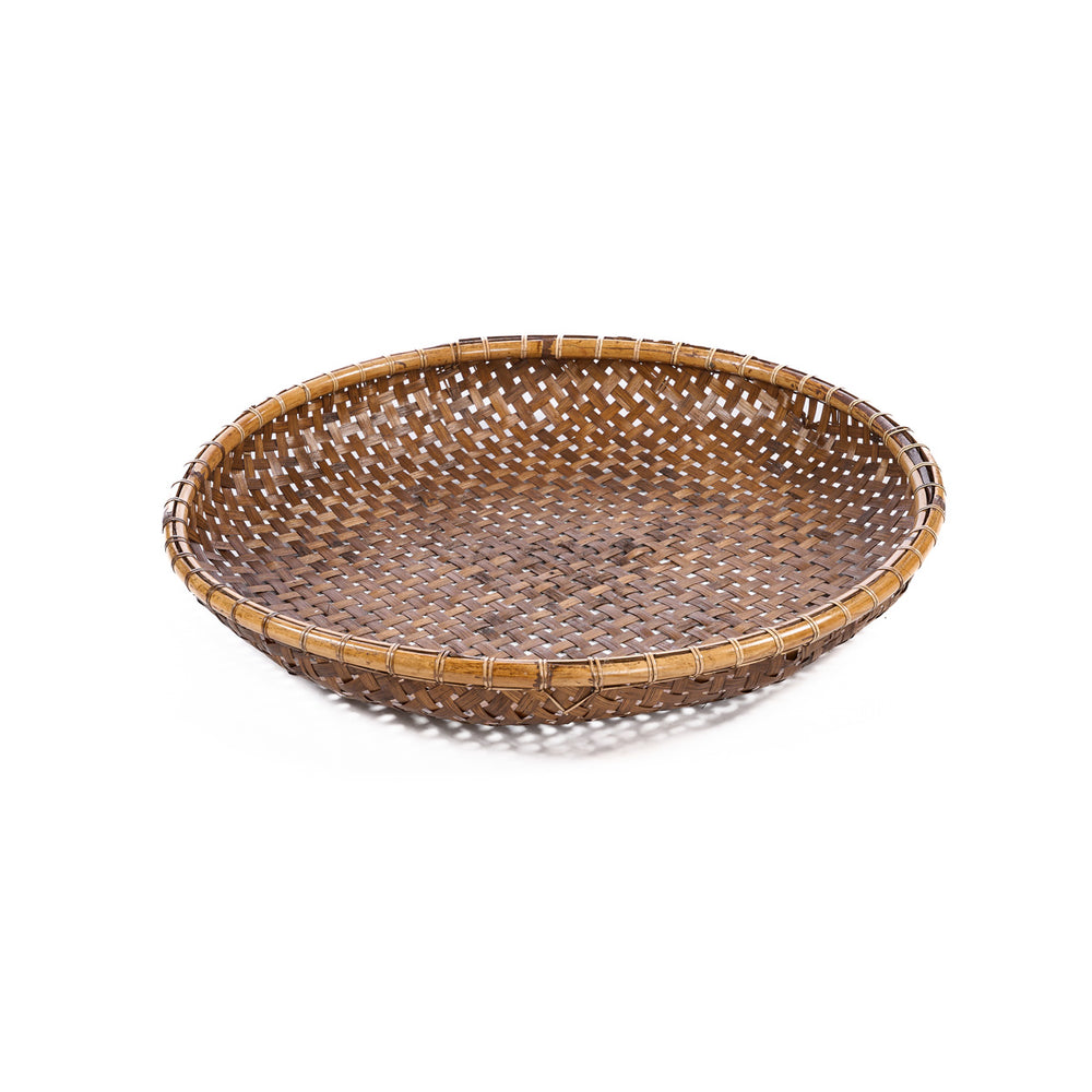 A small bamboo tray in round form, embellished with a natural brown hue and a delicate diamond-woven pattern.